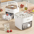 Puzzvo 48-Cube Ice Tray press-type release with ice cubes in drawer